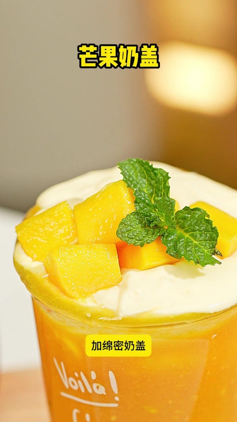Mango cream-top iced tea with Ship Brand Slab Sugar Syrup, fresh mango at the base and a salted cream cap